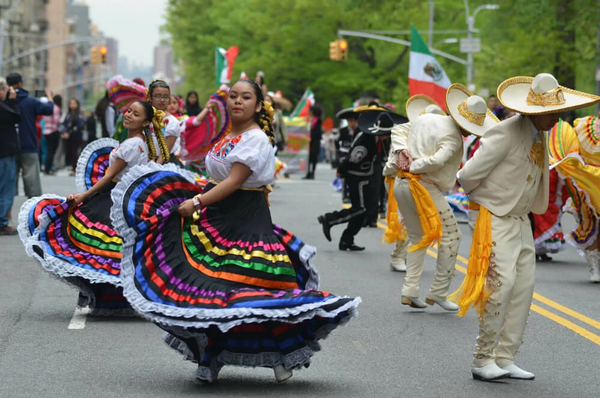 Cinco de Mayo street celebration with dancers.